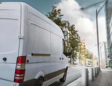 Delivery Van On City Street 1200X1200